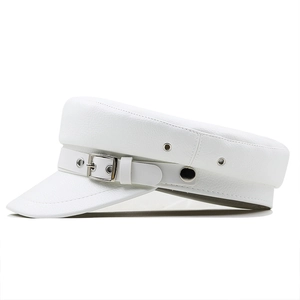 White PU leather newsboy cap with textured finish and silver buckle strap detail