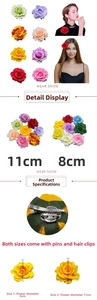 Detail of red fabric rose accessory with dual-function metal hair clip and safety pin back