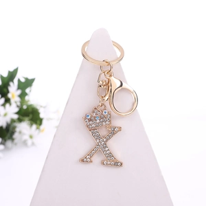 Golden crystal letter X keychain with crown and sparkling rhinestones for backpack