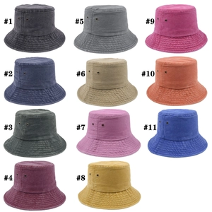 Collection of vintage washed cotton bucket hats in 11 solid colors with metal eyelets