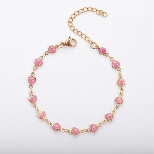 Detail of 13 hot pink glitter heart charms on a gold 18k plated stainless steel chain
