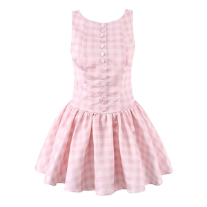 Close-up of pink plaid dress featuring front buttons and a sleeveless A-line silhouette