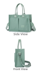Detail view of mint green canvas tote bag showing side pockets and removable shoulder strap