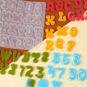 Detail showing translucent silicone alphabet and number mold with colorful resin pieces