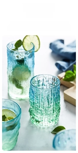 Close-up of glacier-textured glass in gradient blue and green with a hammered finish