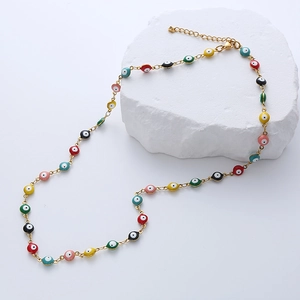 Ethnic 18K gold plated stainless steel necklace with colorful Evil Eye beads on white stones