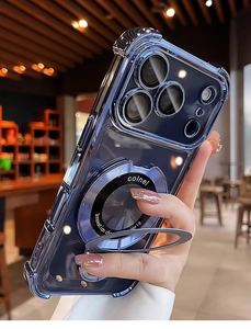 Blue magnetic iPhone case with MagSafe ring and fold-out stand held by a hand