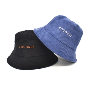 Women's corduroy bucket hats in black and blue with embroidered COCONUT logo letters