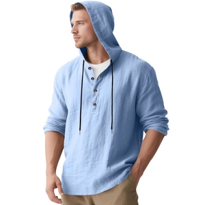 Detailed close-up of light blue linen hooded Henley shirt with vintage button placket