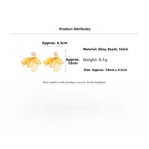 Detail view showing yellow fabric flower earrings with dimensions 7.8cm by 4.5cm