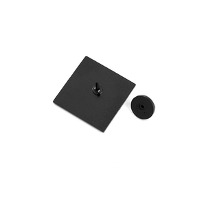 Black matte square badge with rubber clutch pin back on white background