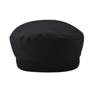 Close-up of the smooth black cotton fabric and fine stitching on this vintage octagonal hat