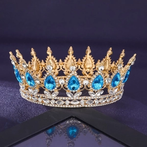 Detail of luxury bridal crown with blue teardrop gemstones and sparkling rhinestones