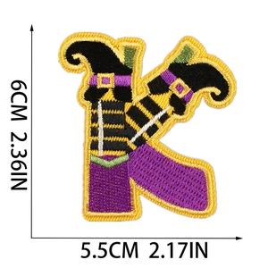 Detailed size view of Halloween letter K embroidery patch with purple and yellow threads