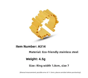 Detail view of gold jagged stainless steel ring with size 7 and 1cm width specifications