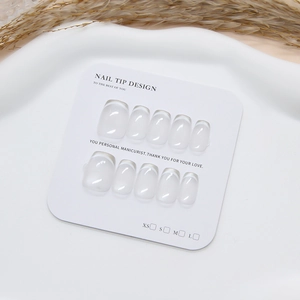 Handmade sheer French cat eye press-on nails set displayed on a white minimalist card