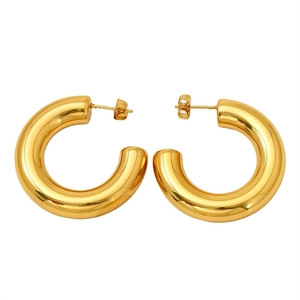 Polished thick gold-plated C-shaped hoop earrings for women with minimalist metal style
