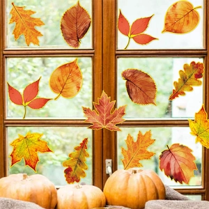 Autumn maple leaf window clings for Thanksgiving home decor with pumpkins in background
