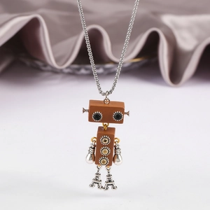 Detailed view of robot pendant with gear eyes and Eiffel Tower legs on silver chain