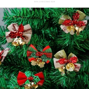 Mini Christmas bow ornament with gold bells and green leaves for festive tree decoration