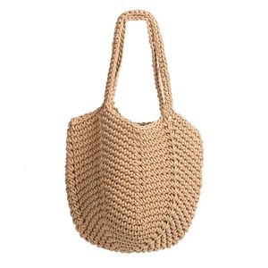 Handmade woven cotton rope shoulder bag in beige with hollow textured bucket design