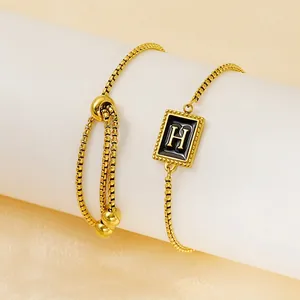 18K gold plated stainless steel H-letter bracelet with black enamel and slider clasp