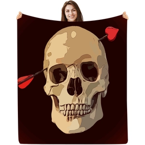 Detail of gothic skeleton flannel blanket with heart arrow digital print pattern