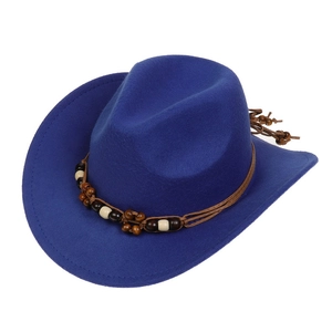 Detail of dark blue felt cowboy hat featuring a beaded decorative band and curved brim