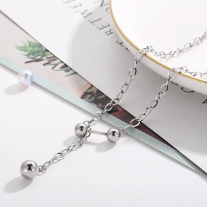 Collier haltère argenté avec perle ronde et chaîne en O pour amateurs de fitness