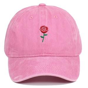 Pink washed cotton baseball cap with red rose embroidery and vintage distressed finish