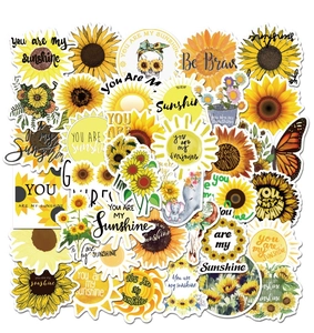 Detail view of sunflower stickers with motivational quotes like you are my sunshine