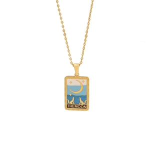 Golden stainless steel tarot necklace with Moon and cats pendant on white background