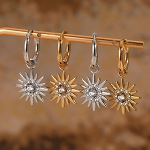 Fashionable stainless steel sun-shaped earrings with zircon crystals in gold and silver