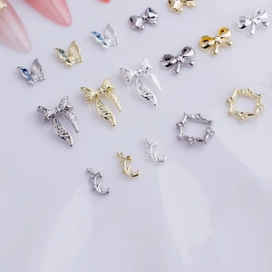 3D alloy bowknot and butterfly nail charms in gold and silver for professional manicures