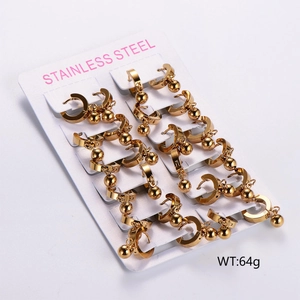 Set of 12 pairs golden stainless steel hoop earrings with bead charms on a display card