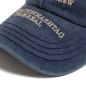 Washed navy cotton baseball cap with premium letter embroidery and sun protection