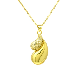Macro detail of gold-plated waterdrop heart pendant with sparkling cubic zirconia inlay