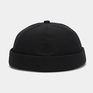 Detail of a minimalist black quick-dry cotton miki hat with six-panel design and roll brim