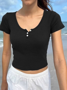 Close-up of black V-neck ribbed T-shirt featuring three white decorative buttons
