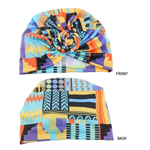 Front and back views of vibrant geometric pattern turban cap with pleated details