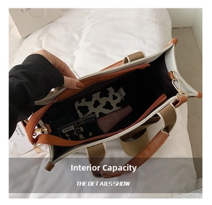 Detailed interior of canvas tote showing inner lining and spacious compartment
