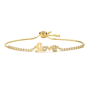 Adjustable gold Love bracelet with white cubic zirconia and tree of life devil eye charms