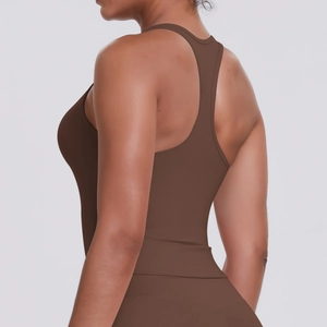 Detail view of the racerback design and fitted fabric on this brown sports tank top