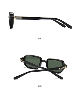 Detail view of vintage chunky sunglasses showing gold metal hinges and side profile