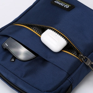 Dark blue men's shoulder bag in durable fabric with zipper pocket for headphones and glasses