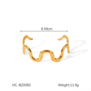 Detailed view of wave-shaped 18K gold stainless steel bangle with dimensions and weight info