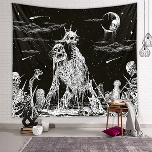 Gothic skull tapestry with twin skeletons and cemetery scene hanging on a white brick wall