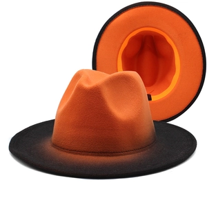 Dual-tone felt fedora with orange to black gradient and vibrant orange interior view