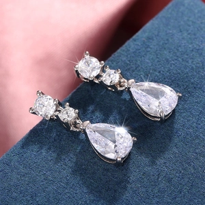 Elegant silver-tone teardrop earrings with three-stone zircon drop and pear-cut design