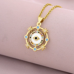 Elegant 18K gold plated evil eye pendant necklace with colorful zircon on purple fabric